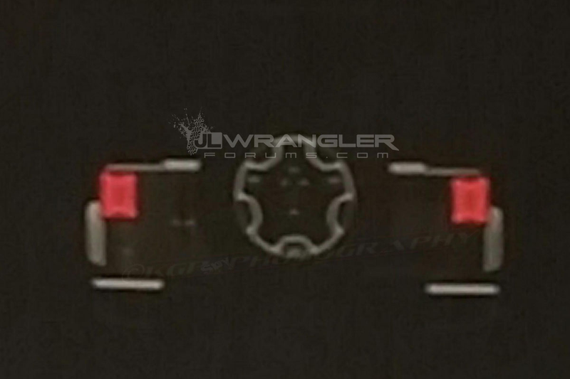 Illustration for article titled Here's The Best Look Yet At The Face Of The Next Jeep Wrangler
